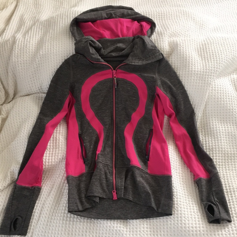 Lululemon dry fit jacket with collar, hoodie, pockets, and thumb sleeves.